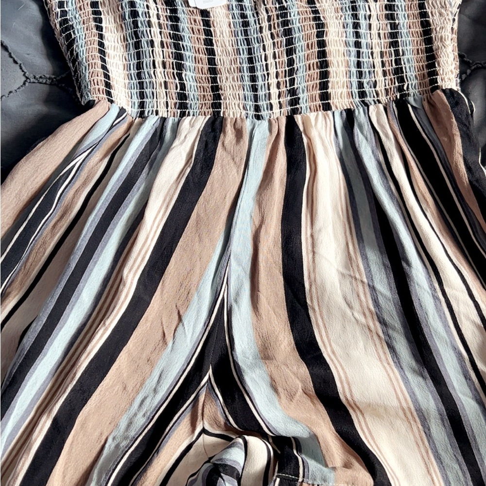 Chic Striped Jumpsuit in Black, Blue, and Cream